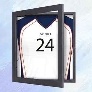 Open view detail of jersey display frame with magnetic flip door and dark wood finish