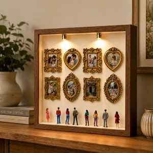 Detail view of DIY mini museum shadow box with lit photo frames and small figures.
