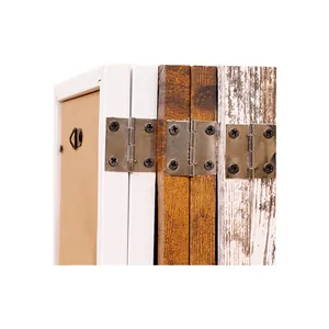 Close-up detail view of metal hinges on multi-colored wooden pet memorial frames