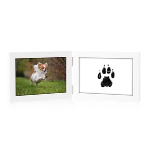 Minimalist white wooden hinged double pet memorial photo frame with paw print design