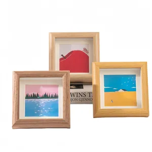Set di cornici quadrate in legno nordico in tre finiture venatura del legno naturale