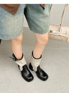 Retro color-block western boots for women featuring black and beige contrast details