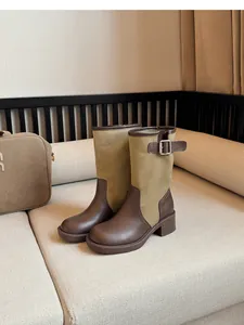 Vintage patchwork western cowboy boots for women featuring brown leather and canvas detail