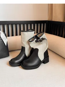 Vintage patchwork western rider boots with beige canvas shaft and black faux leather