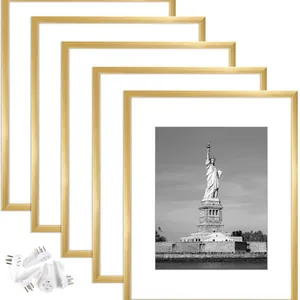 Set of 5 minimalist gold PVC picture frames including white mats and wall hanging hooks