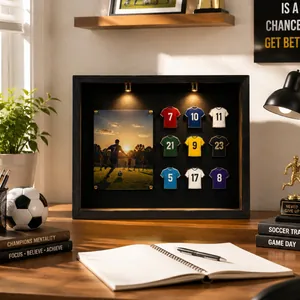 Detailed close-up of a sports-themed shadow box displaying soccer jersey pins with LED lights