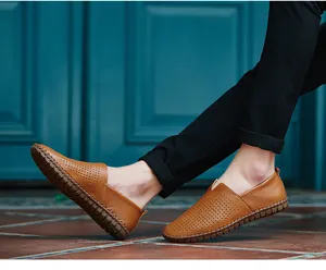 Classic men's brown perforated leather loafers in a casual slip-on style for daily wear