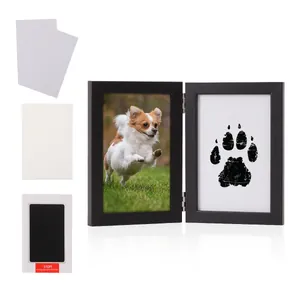Complete pet paw print memorial kit with wooden hinged frame and clean-touch ink pad