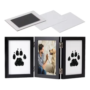 Black wooden tri-fold photo frame set with DIY pet inkless paw print kit for dog