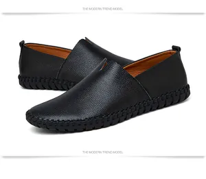Detailed view of men's black cowhide leather loafers with hand-stitched sole finish.