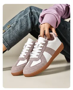 Vista dettagliata delle sneakers retro GAT con inserti in pelle scamosciata e suola in gomma.