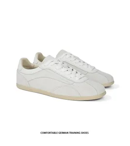 Close-up detail of men's vintage suede German training shoes with minimalist design