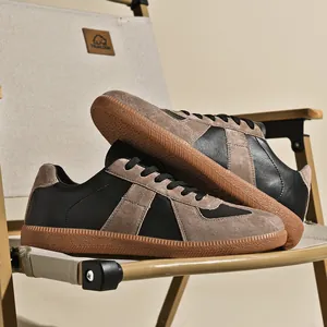 Sneaker rétro stile German Army Trainer nere e marroni con dettagli in pelle scamosciata