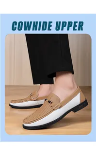 Detail view of men's perforated leather loafers with metal buckle and soft sole