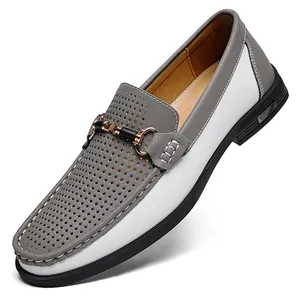Grey and white perforated men's leather loafers with metal buckle detail