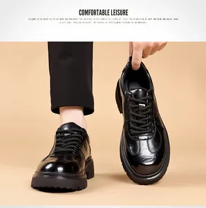 Detailed look at men's thick sole black leather shoes featuring crocodile pattern