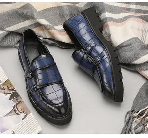 Blue crocodile pattern men's leather shoes with double monk straps and platform sole.