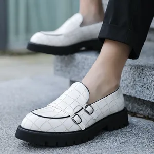 Modern white men's monk strap loafers with crocodile pattern and thick black platform sole