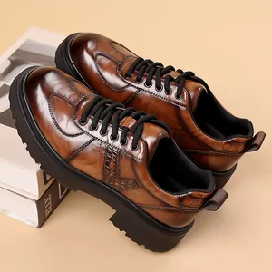 Men's brown leather derby shoes with thick soles and crocodile texture accents