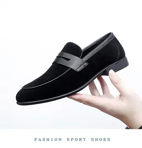Professional side view of black suede men's loafers with elegant leather strap detail
