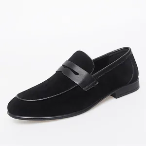 Elegant black suede men's loafers with leather strap detail for business attire.