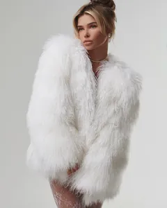 Close-up detail showing the fluffy white faux mongolian lamb fur texture on a model