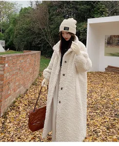Full-length elegant white lamb wool faux fur winter coat featuring stylish buttons