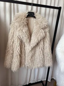 Detailed view of a premium women's beige shaggy faux fur coat with elegant notch lapel