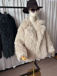 Beige faux fur Mongolian lamb style winter coat detail view on a mannequin head
