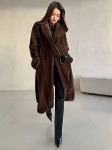 Full-length view of a luxurious brown faux fur coat with a soft mink-like texture.