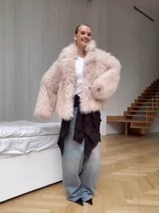 Elegant beige shaggy faux fur coat for women, stylish cozy autumn winter outerwear jacket
