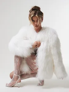 Elegant white faux fur coat in Mongolian sheepskin style for glamorous winter parties