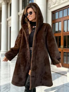 Luxurious long hooded faux fur coat for women in dark brown textured finish for winter