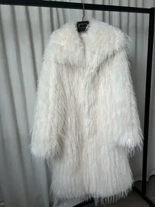 Elegant long-length white faux fur coat for women featuring a large plush lapel design