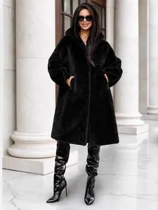 Luxurious long black faux fur coat for women with hood and oversized winter design