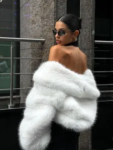 Elegant women's plush white faux fur coat for a sophisticated urban winter style