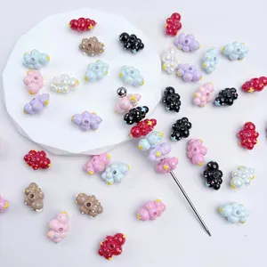 Detail view of colorful hand-painted cloud beads for DIY accessories and jewelry