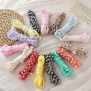 Detail view of 5mm colorful houndstooth polyester ropes for DIY lanyard projects