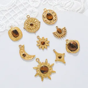 Close-up of 18K gold plated stainless steel pendants with tiger eye stones for DIY