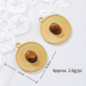 Gold-plated stainless steel pendant with tiger eye stone and sunburst pattern detail