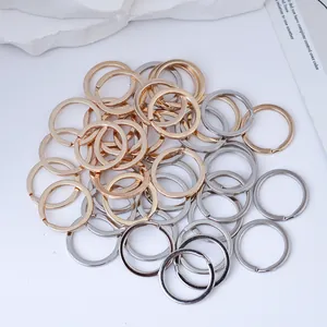 Close-up view of premium gold and silver alloy split rings for DIY keychain craft projects