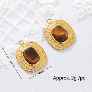 Tiger eye stone pendant detail in 18K gold plated steel, 18mm x 14mm size.