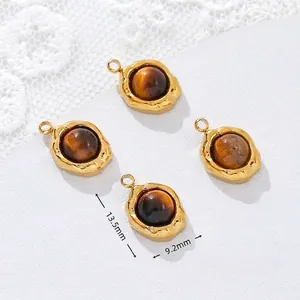Detailed view of gold-plated tiger eye stone pendants for DIY jewelry necklace making
