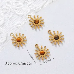 Detailed size view of four sun-shaped tiger eye stone pendants with gold plating