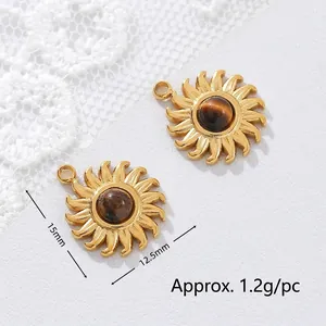 Detailed macro view of 18K gold plated sun charms with tiger's eye stone and measurements