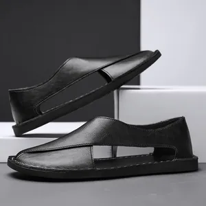 Side view of black men's casual sandals featuring stylish side cutouts and a closed toe.