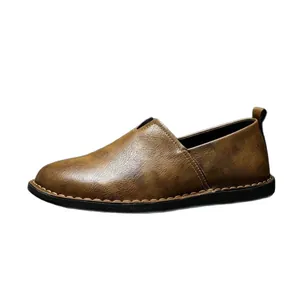 Mocasines vintage de cuero marrón para hombre con suela blanda hecha a mano y hueco lateral