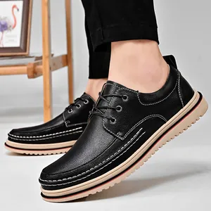 Men's casual black leather shoes featuring thick beige soles and white stitching