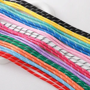 Detailed close-up of 5mm colorful braided polyester ropes with dotted patterns for DIY