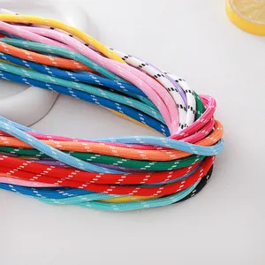 Close-up detail of 5mm colorful braided polyester cord with a decorative white dotted texture
